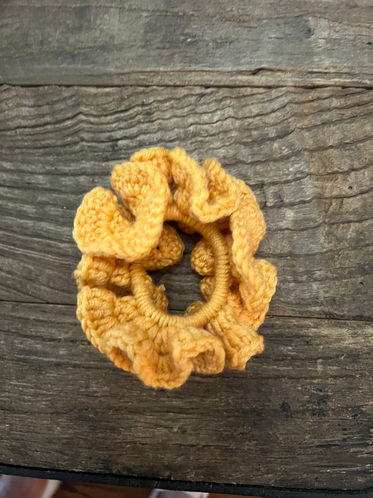 Hand crocheted gold, wool scrunchie